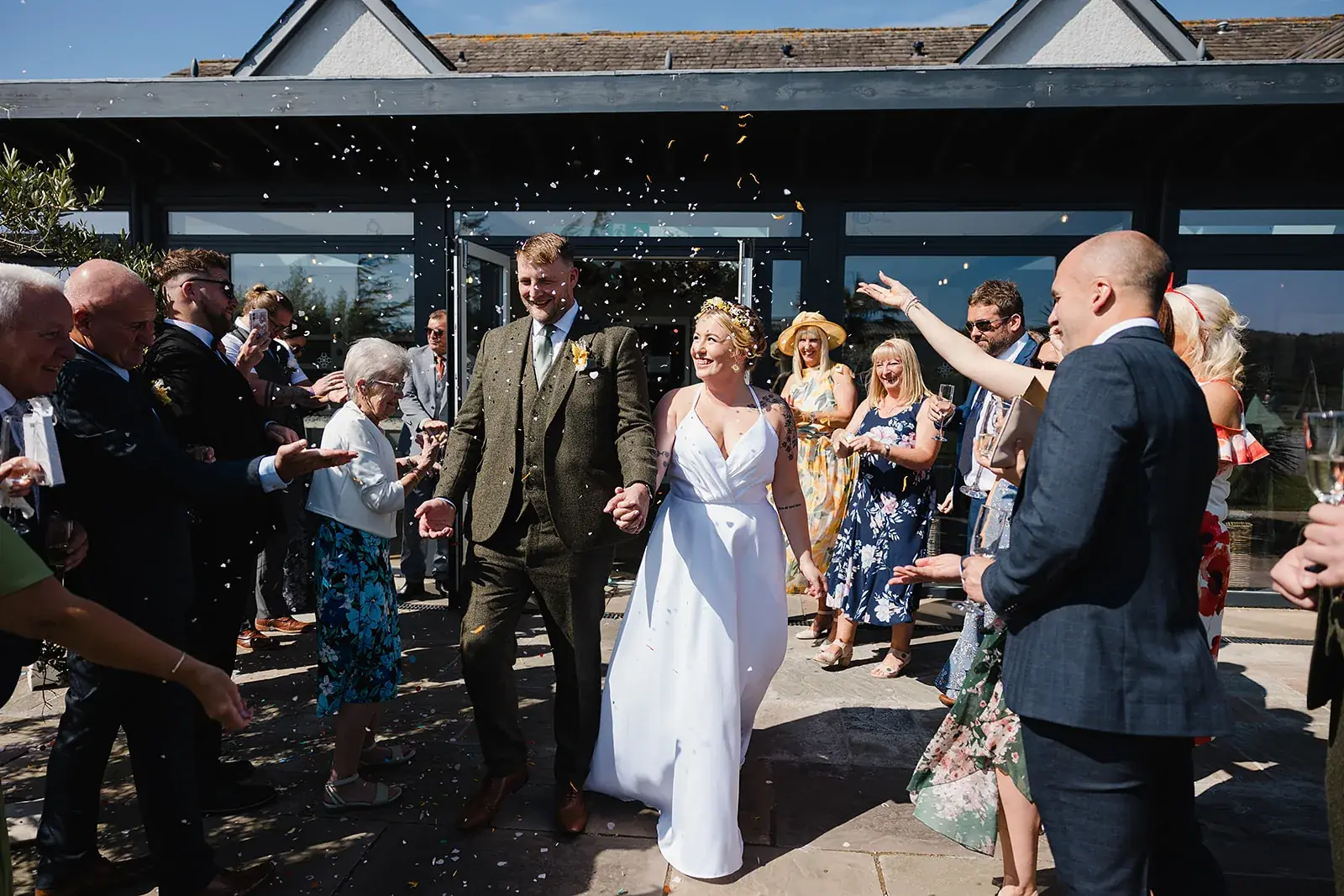 Confetti on the terrace as the couple come out