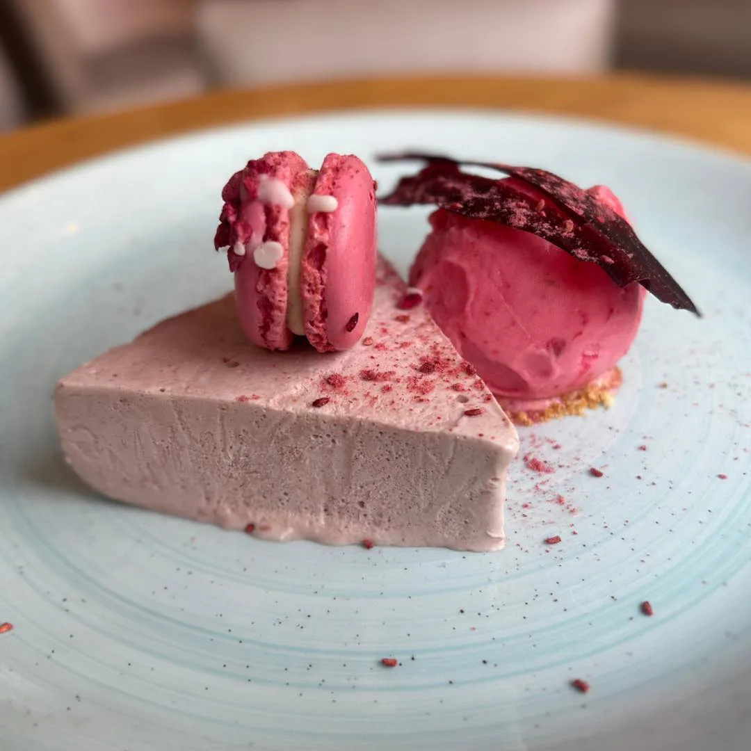 Raspberry cheesecake with raspberry sorbet and a macaron